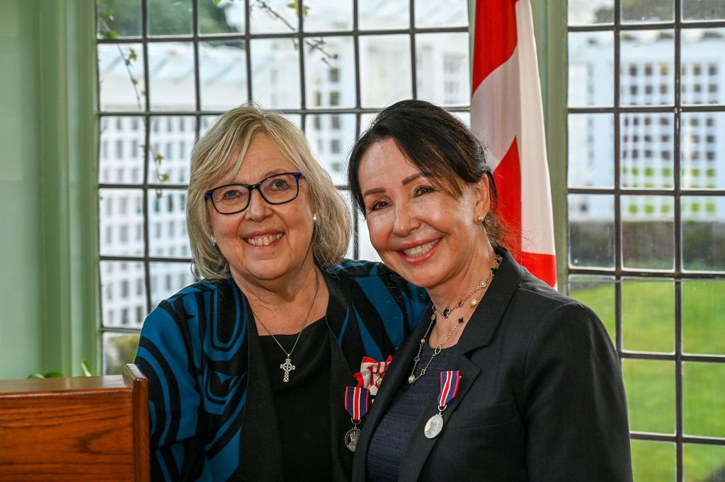 Elizabeth May (left) and Christine Penney
